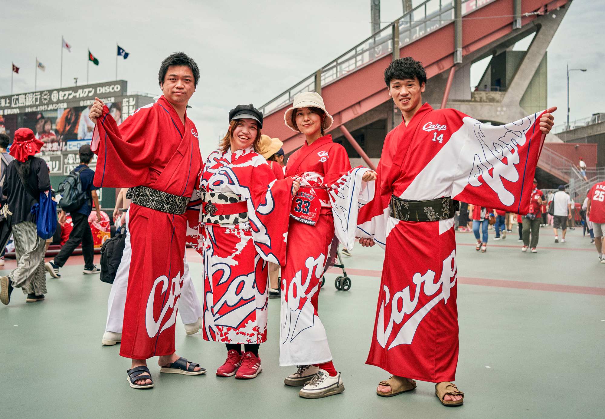 Members of Hiroshima Toyo Carp celebrate after winning the Central